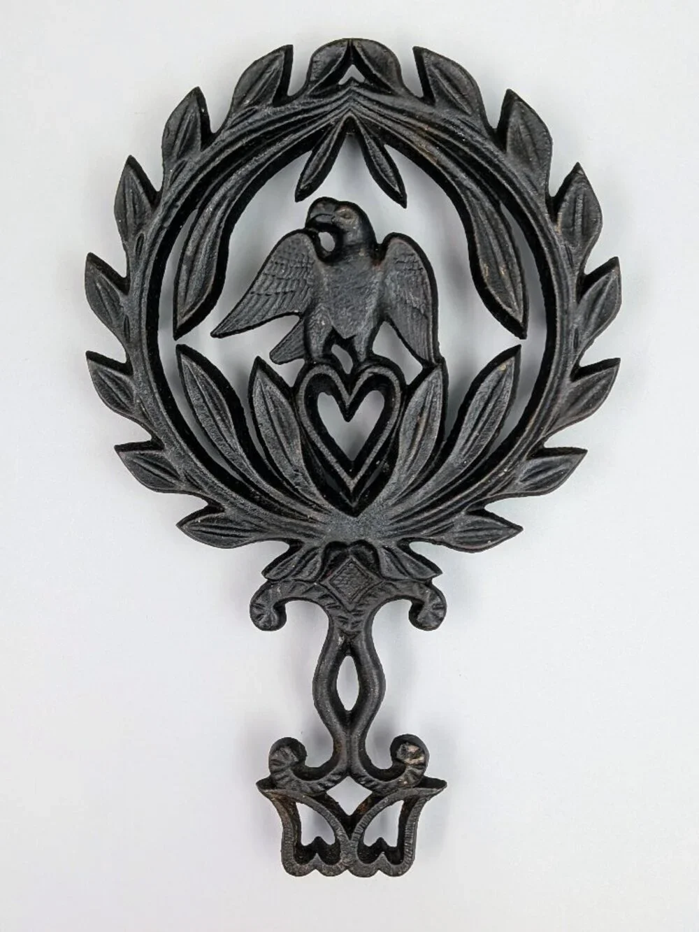 Vintage Black Cast Iron Trivet:, American Eagle over Heart with Laurel Wreath